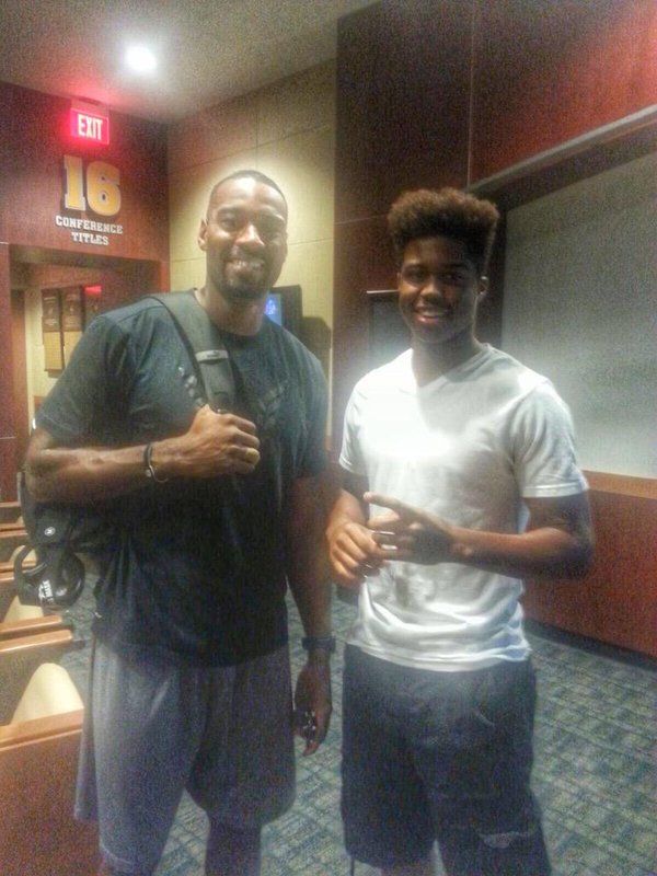 Tubbs with future Hall of Fame WR Calvin Johnson